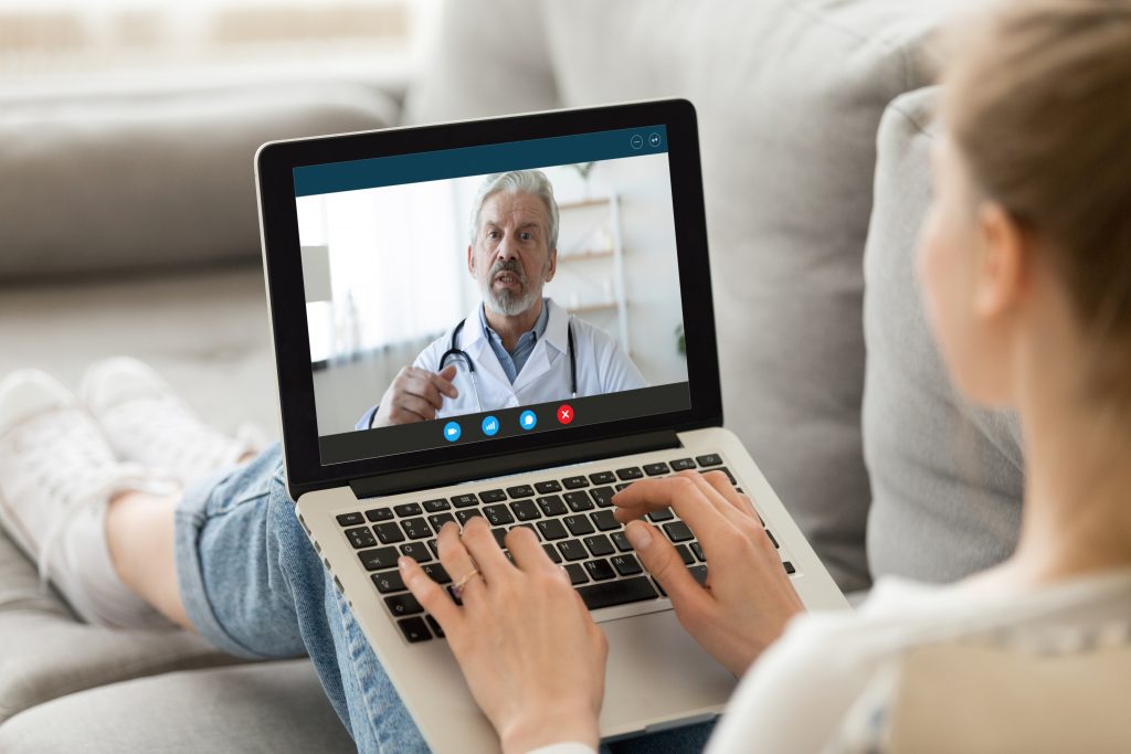 Female patient consult with doctor online using video call