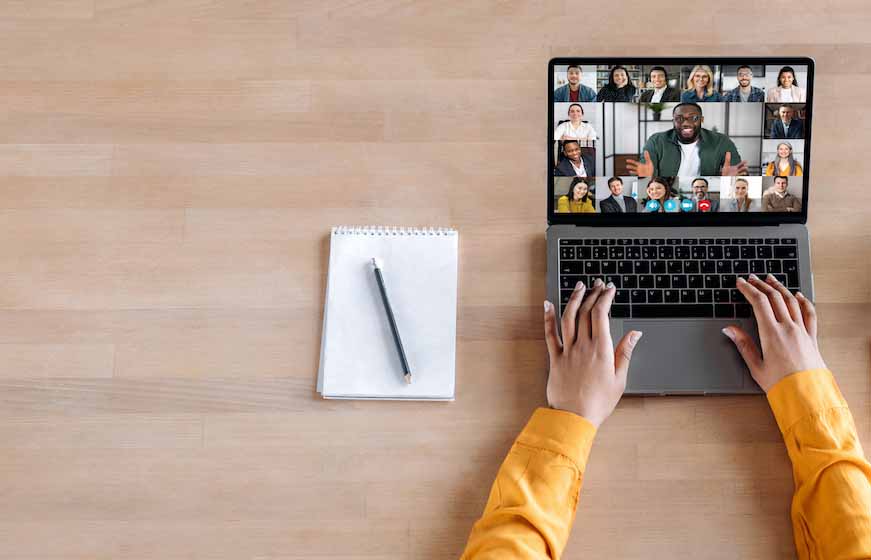 Online business briefing, virtual meeting. Panoramic photo of laptop screen with webcam shots of multi ethnic business partners communicates from home by a video conference, online webinar. Copy space
